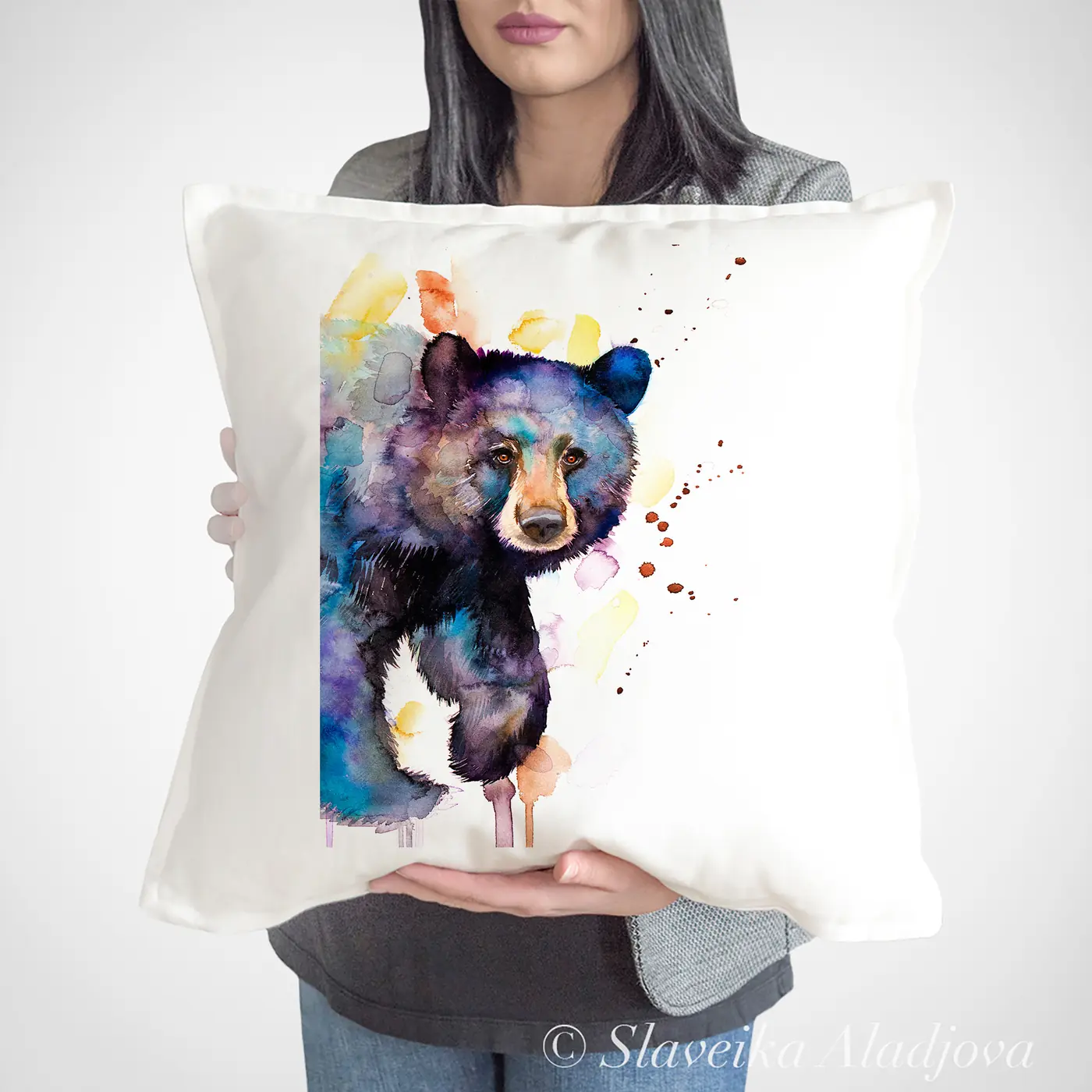 Cushion with a watercolour black bear in purple print