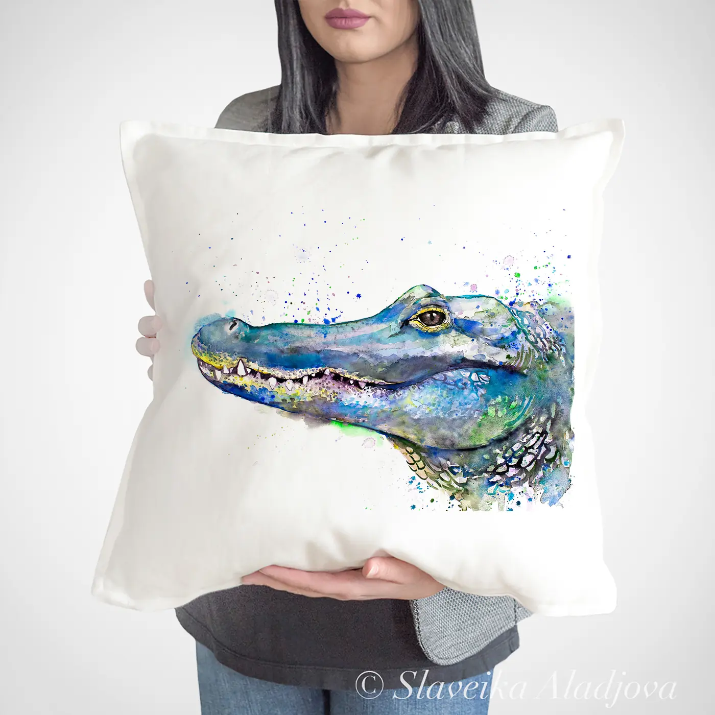 Cushion with a watercolour alligator print