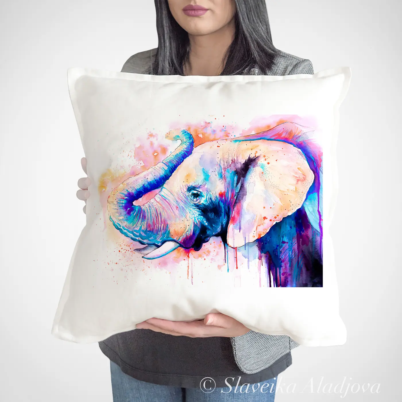 Cushion with a watercolour elephant in purple print