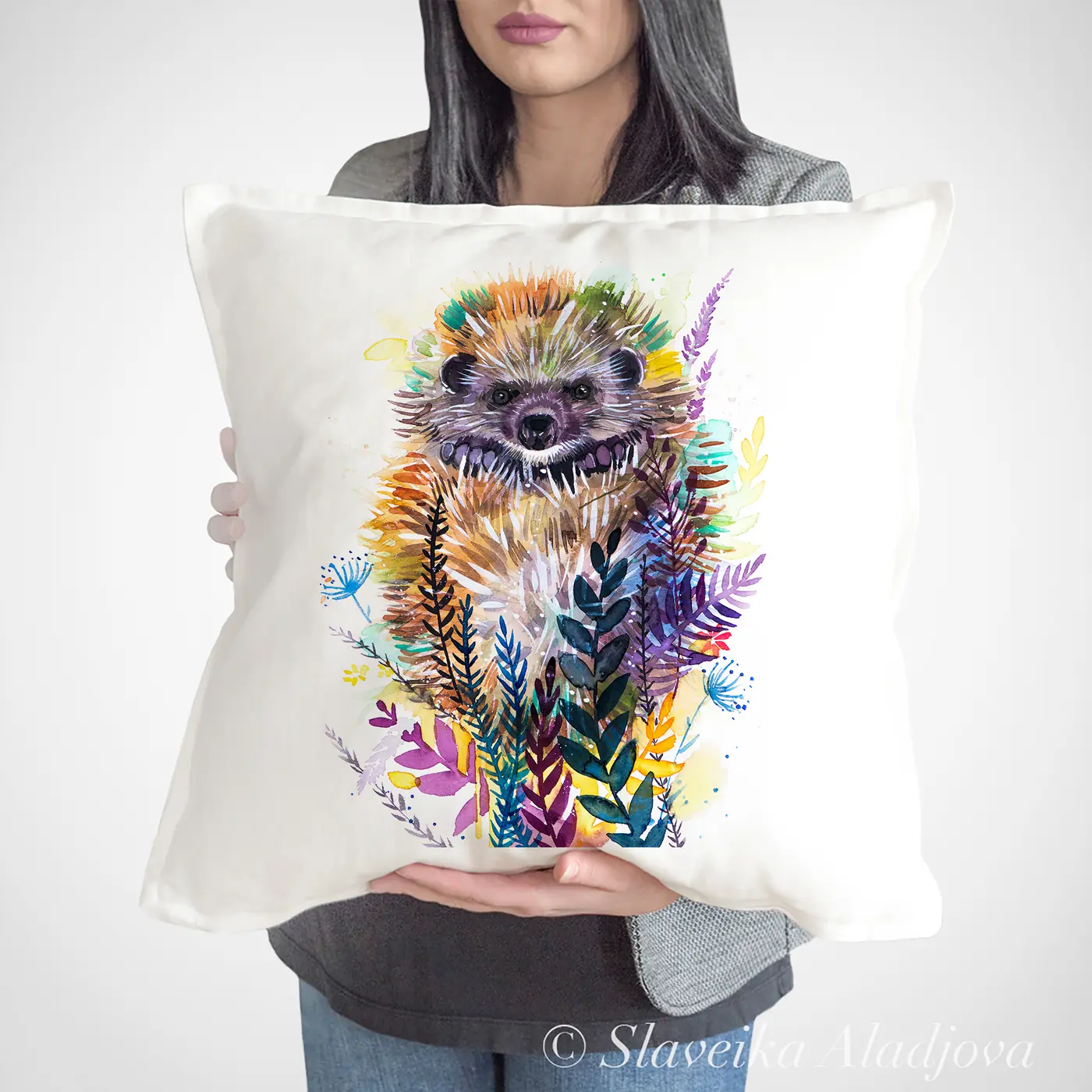 Cushion with a watercolour hedgehog print