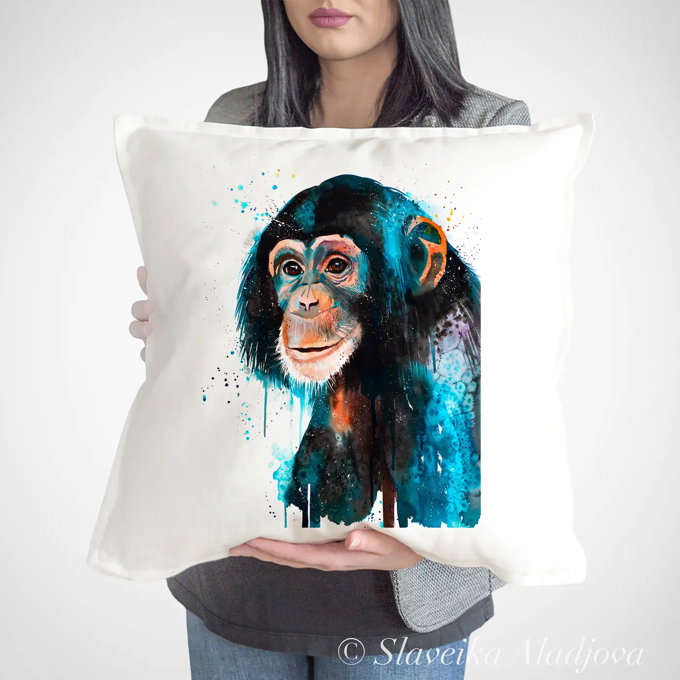 Cushion with a watercolour young chimpanzee print