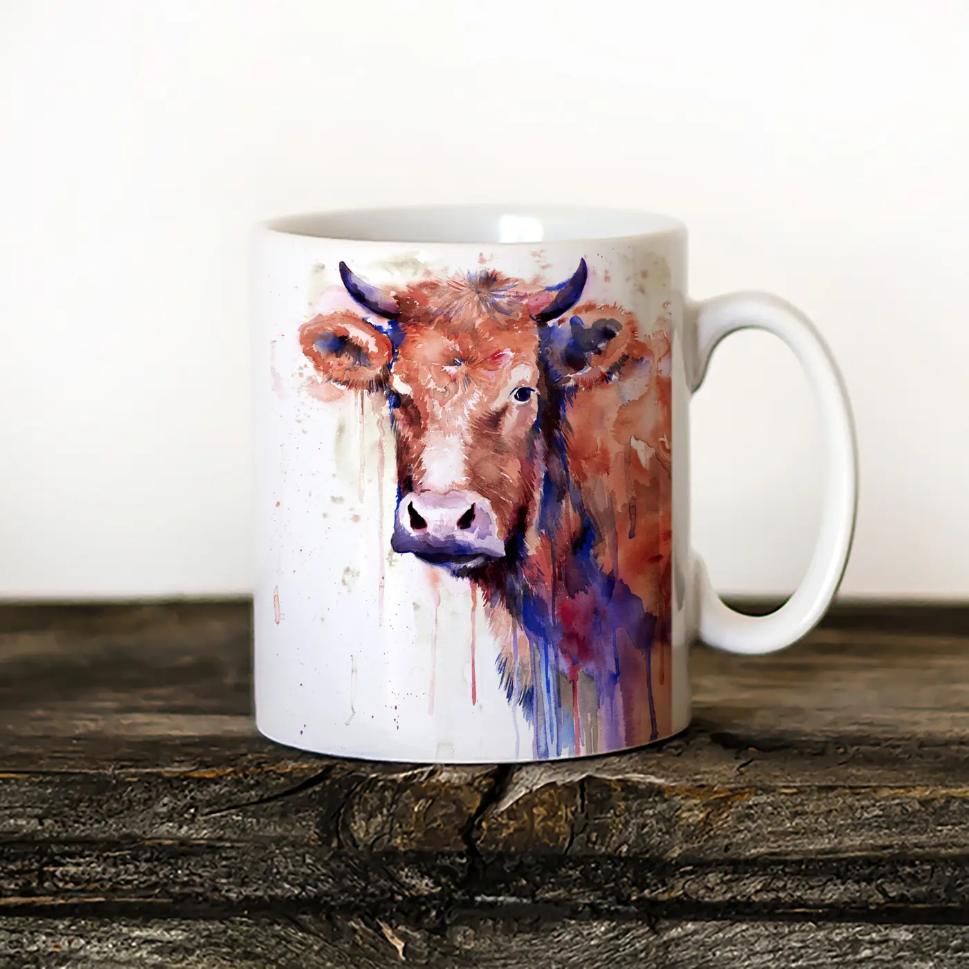 Ceramic mug with a watercolour cows print