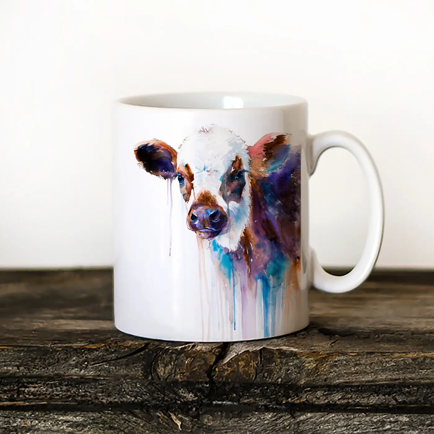 Ceramic mug with a watercolour cow print
