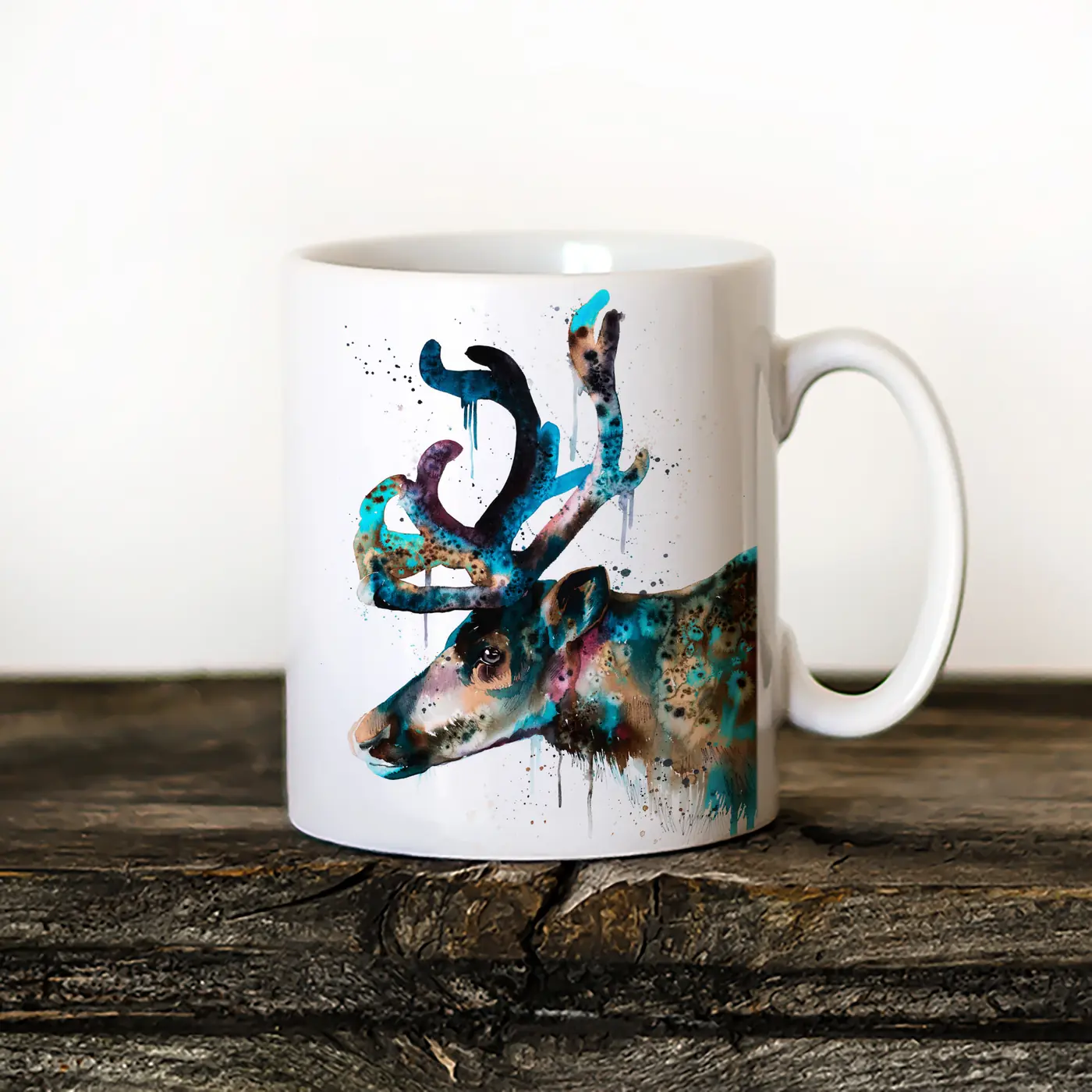 Ceramic mug with a watercolour reindeer in blue print