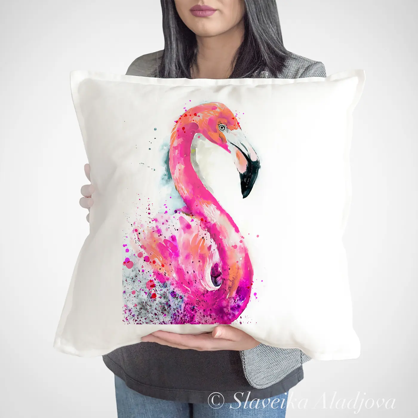 Cushion with a watercolour flamingo print