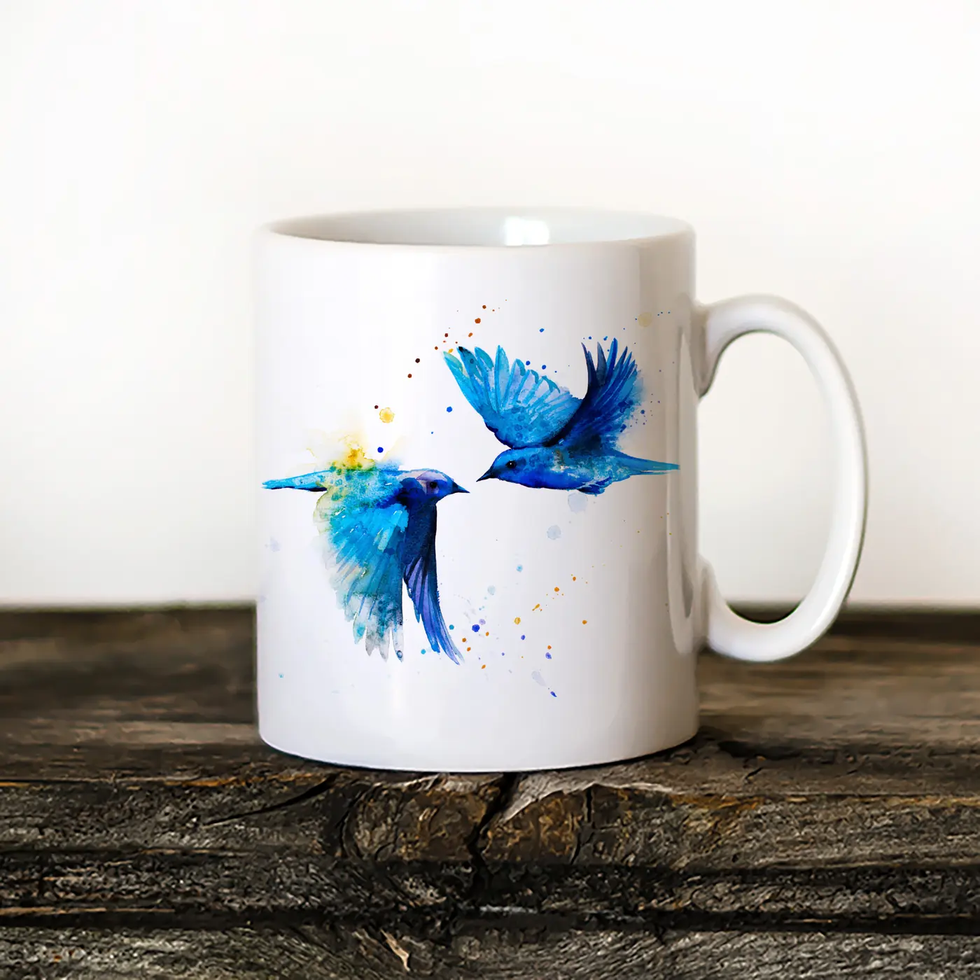 Ceramic mug with a watercolour bluebirds print