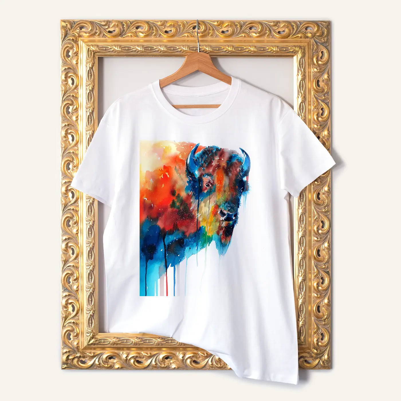White t-shirt with a watercolour bison in orange print