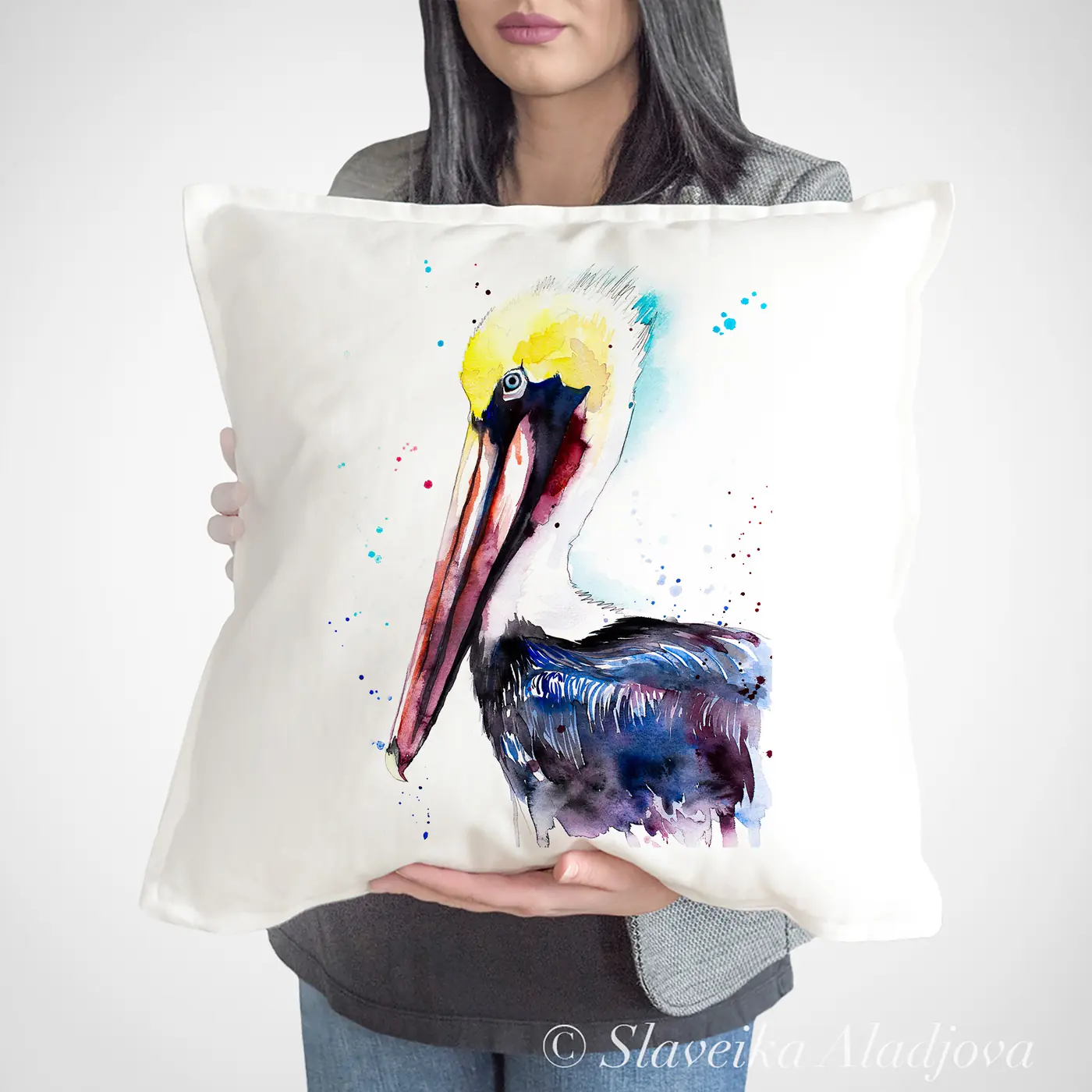 Cushion with a watercolour brown pelican print