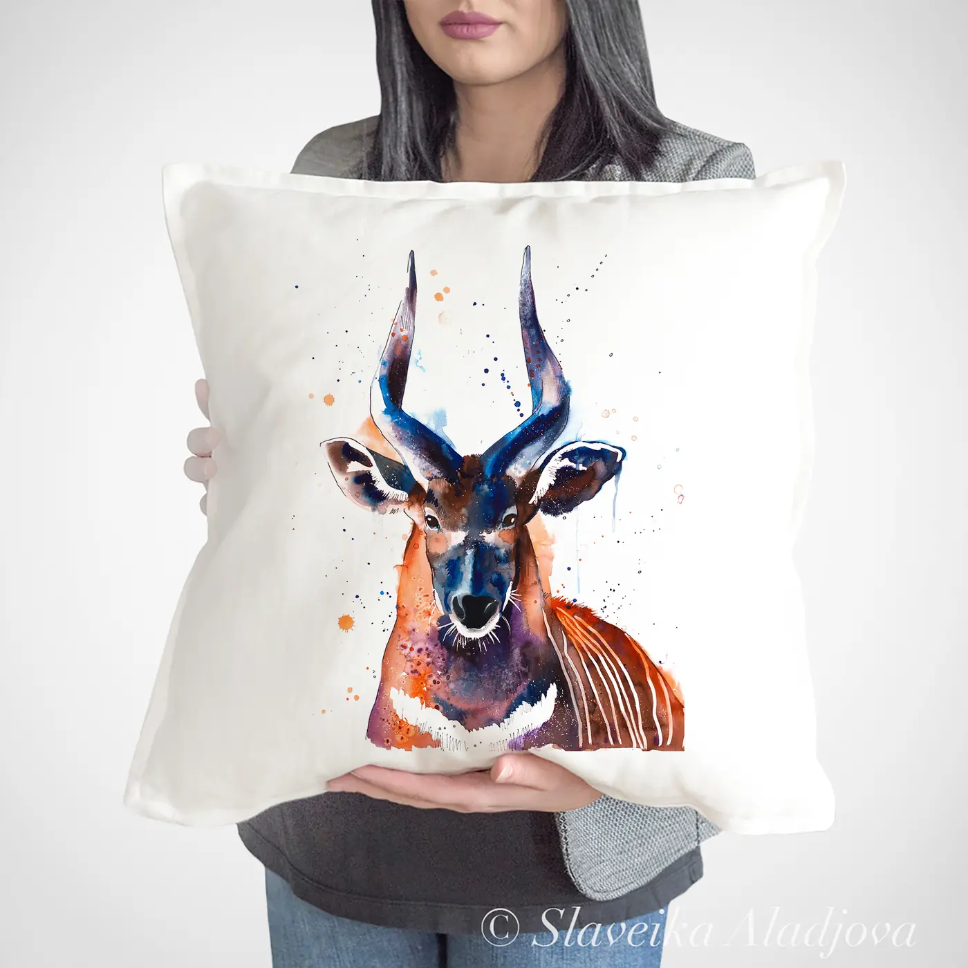 Cushion with a watercolour bongo antelope print