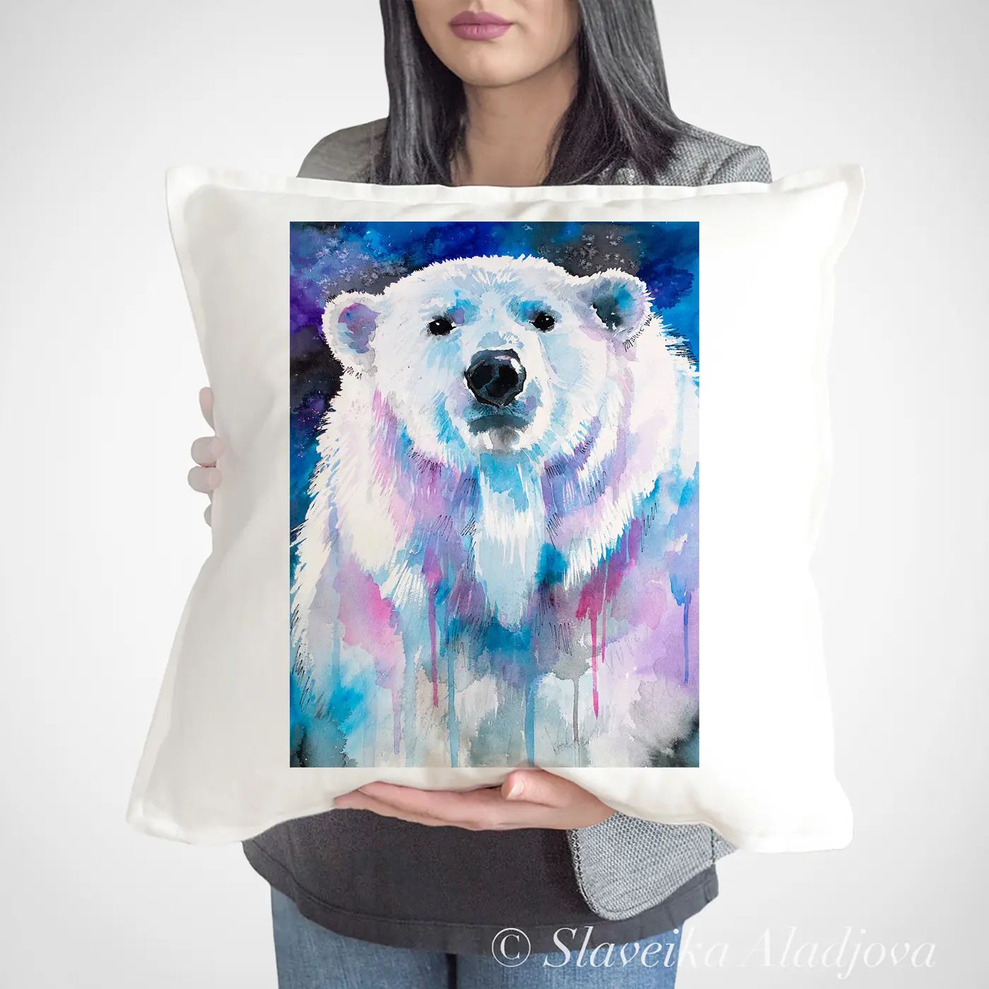 Cushion with a watercolour polar bear on blue print
