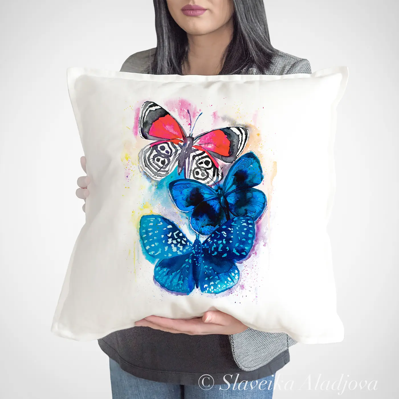 Cushion with a watercolour blue butterflies print