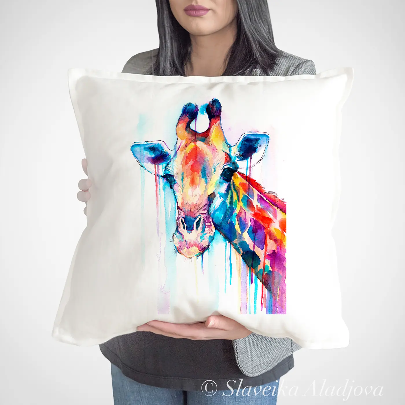 Cushion with a watercolour giraffe print