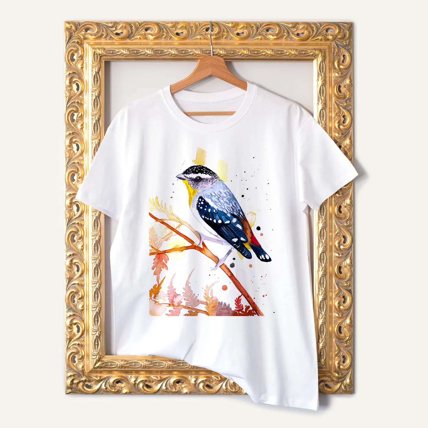 White t-shirt with a watercolour spotted pardalote print