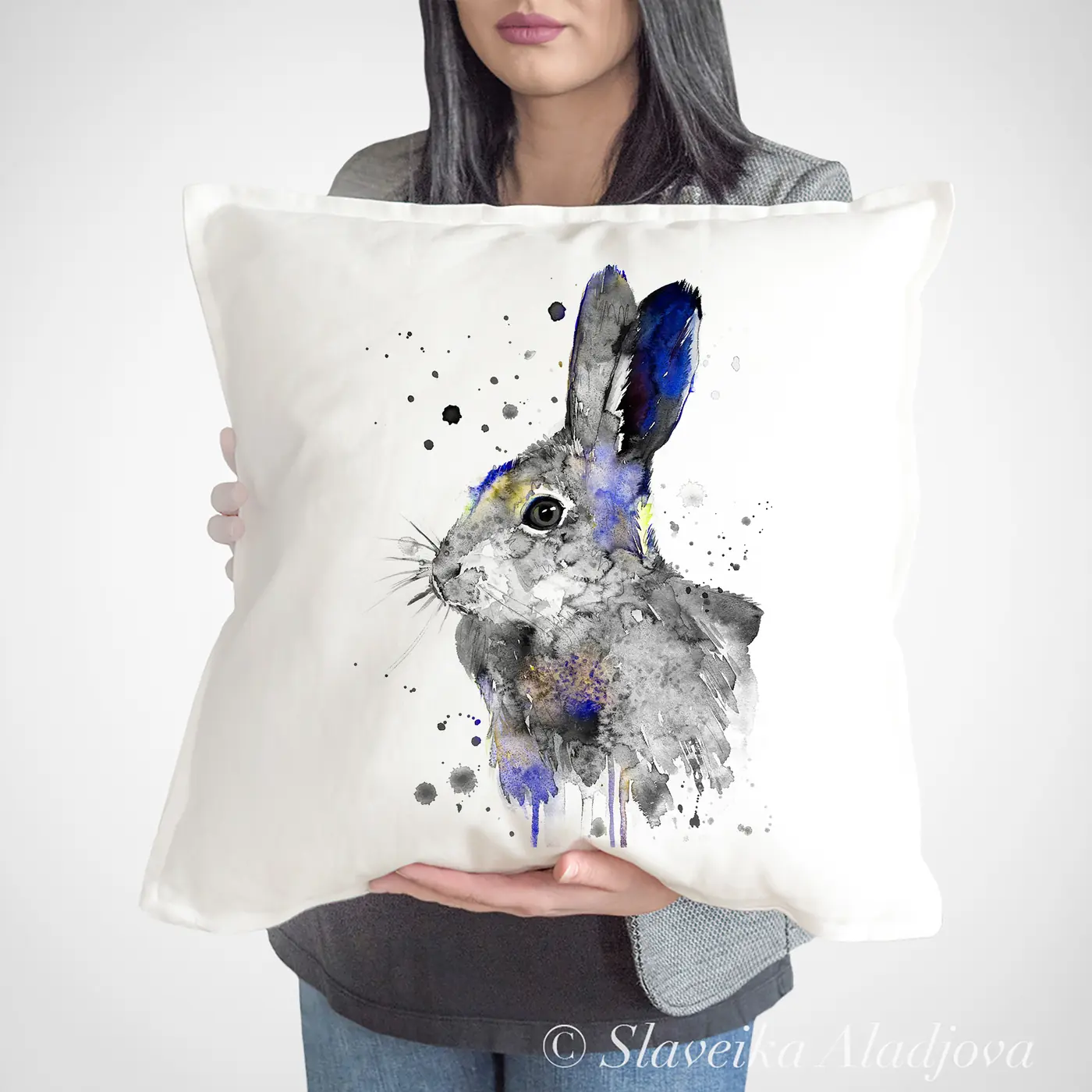 Cushion with a watercolour grey hare print