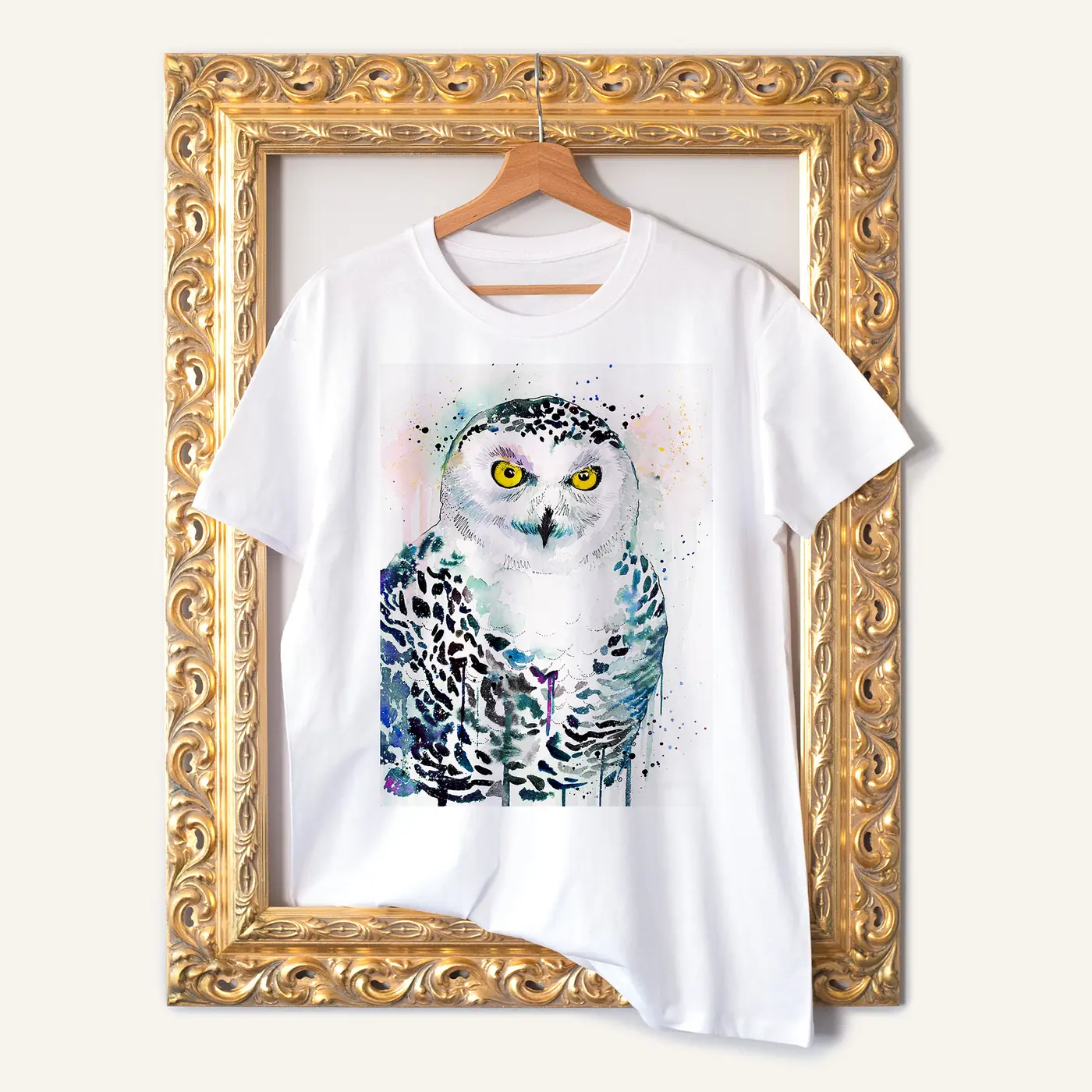 White t-shirt with a watercolour snowy owl print