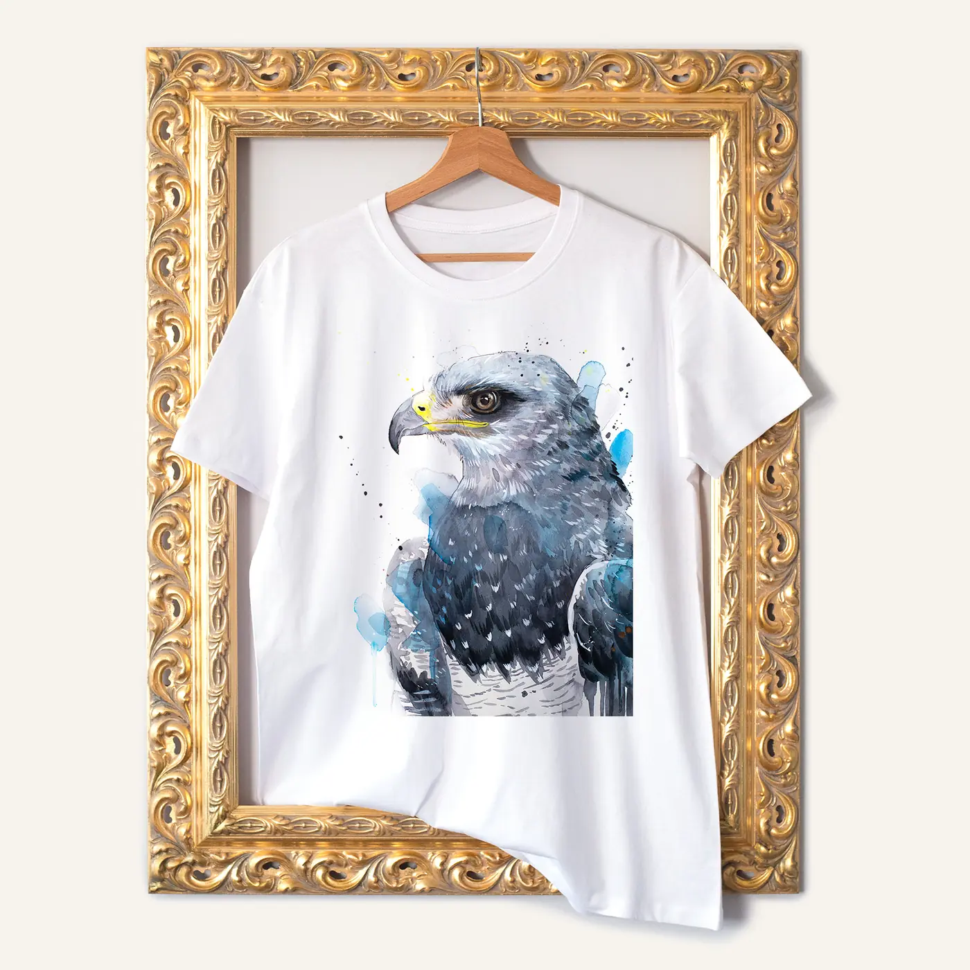 White t-shirt with a watercolour black-chested buzzard-eagle print